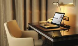 Hotel desk with laptop connected to Liveport hotel wifi service.